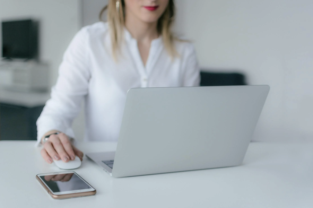 Woman intently working on her laptop